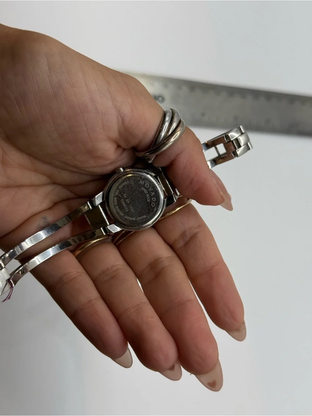 Movado Ladies Silver Tone Dial Bangle Bracelet Watch with two extra links